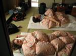 Sleeping on the floor in a Japanese style hotel - May, 2004