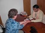 Tami's Palm Reader at the Jaypee, Agra, India by Roger J. Wendell - December 02, 2008