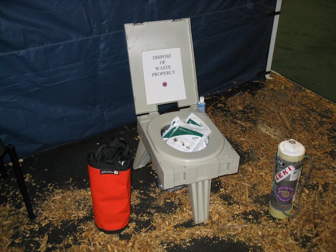 http://www.rogerwendell.com/images/toilet/portable_camp_toilet.jpg